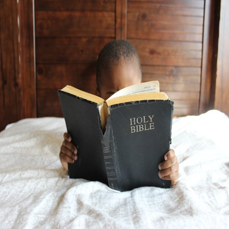 - LAMINATED POSTER Education Boy Bible Reading Child African Bed Poster Print 24 x 36