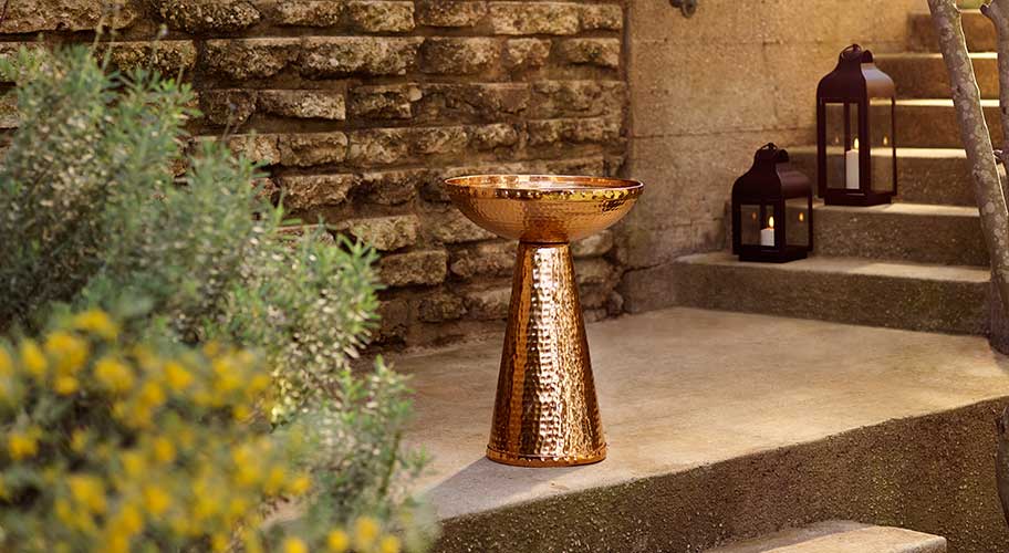 A peaceful retreat. Create a lush landscape inspired to delight all the senses with beautiful outdoor decor. Bubbling water and flickering candlelight complement the greenery of a serene space. A peaceful retreat. Create a lush landscape inspired to delight all the senses with beautiful outdoor decor. Bubbling water and flickering candlelight complement the greenery of a serene space.